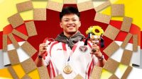 Lifter Rahmat Erwin Abdullah berhasil menyabet medali perunggu di Olimpiade Tokyo 2020 (Dok. Istimewa/setkab.go.id)